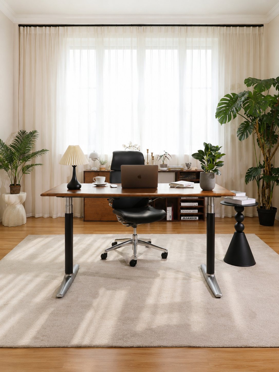 Black with Silver solid walnut standing desk in a home workspace