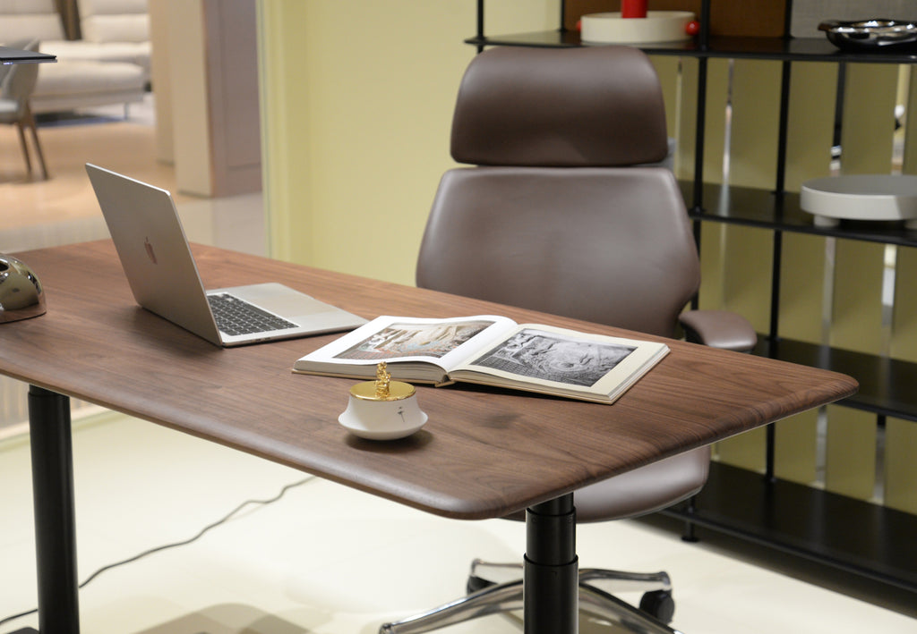 Black walnut desktop in a refined workspace