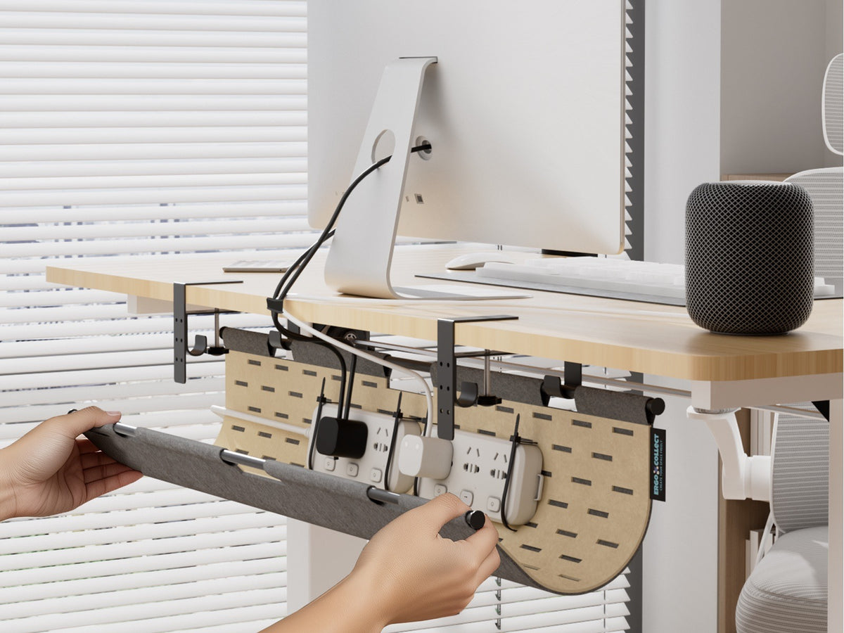 Felt cable management panel opened by hand for access to plugs and adapters