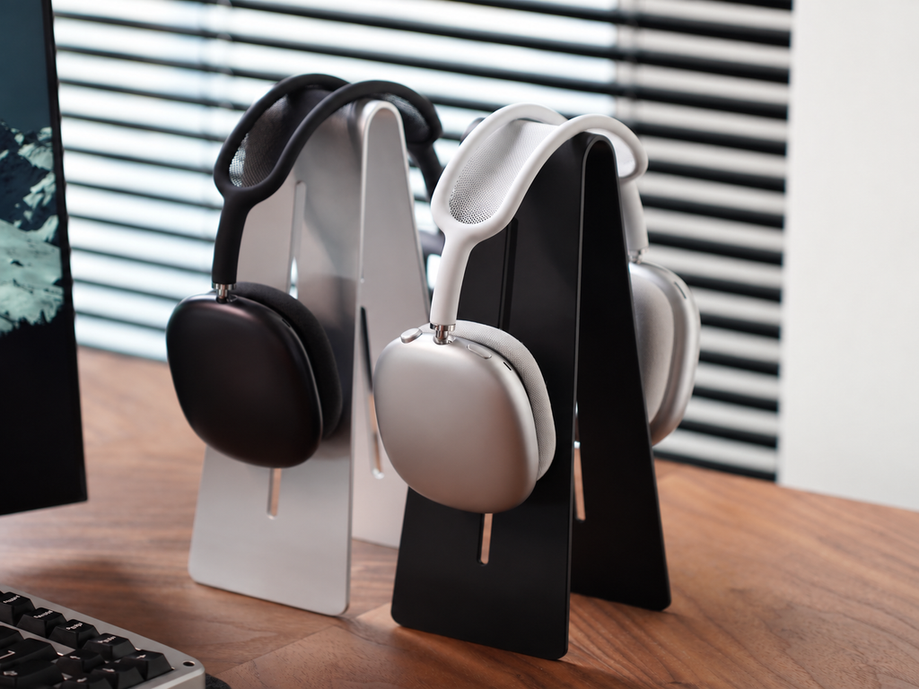 Black and silver aluminum headphone stands displayed together