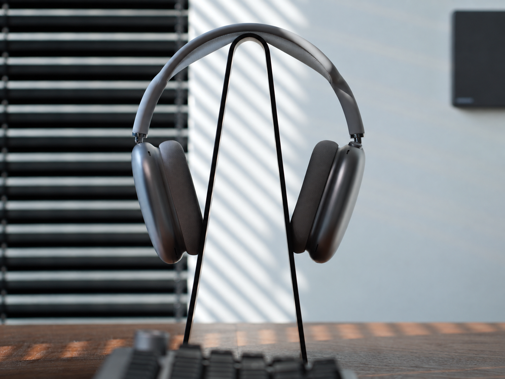 Black aluminum headphone stand with over-ear headphones, front view