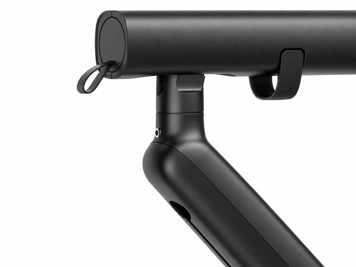 M2 black single-monitor arm upper arm and cable routing detail