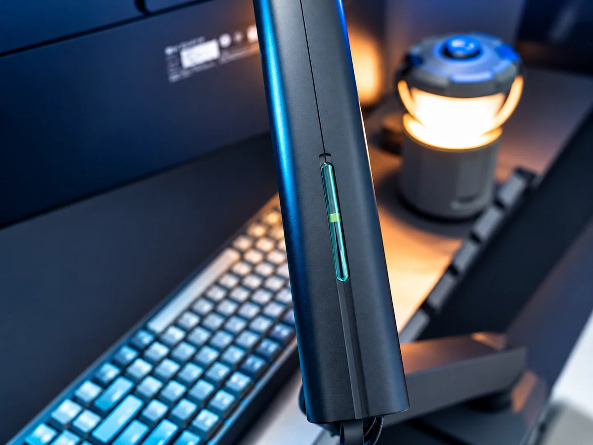 M2 black single-monitor arm cable-cover detail