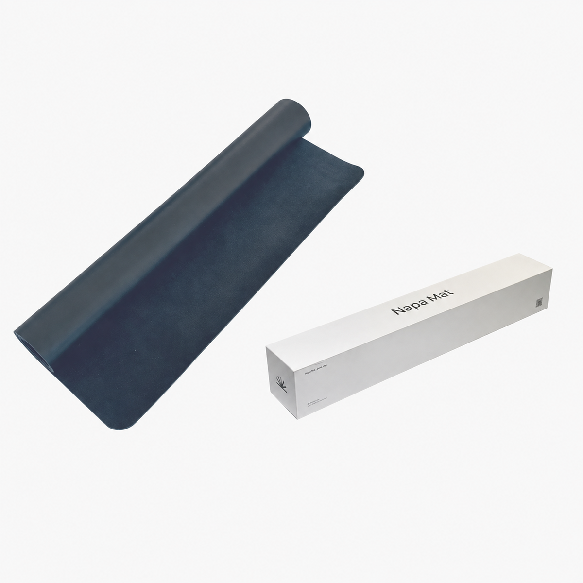 Napa Leather Desk Mat rolled beside its packaging box