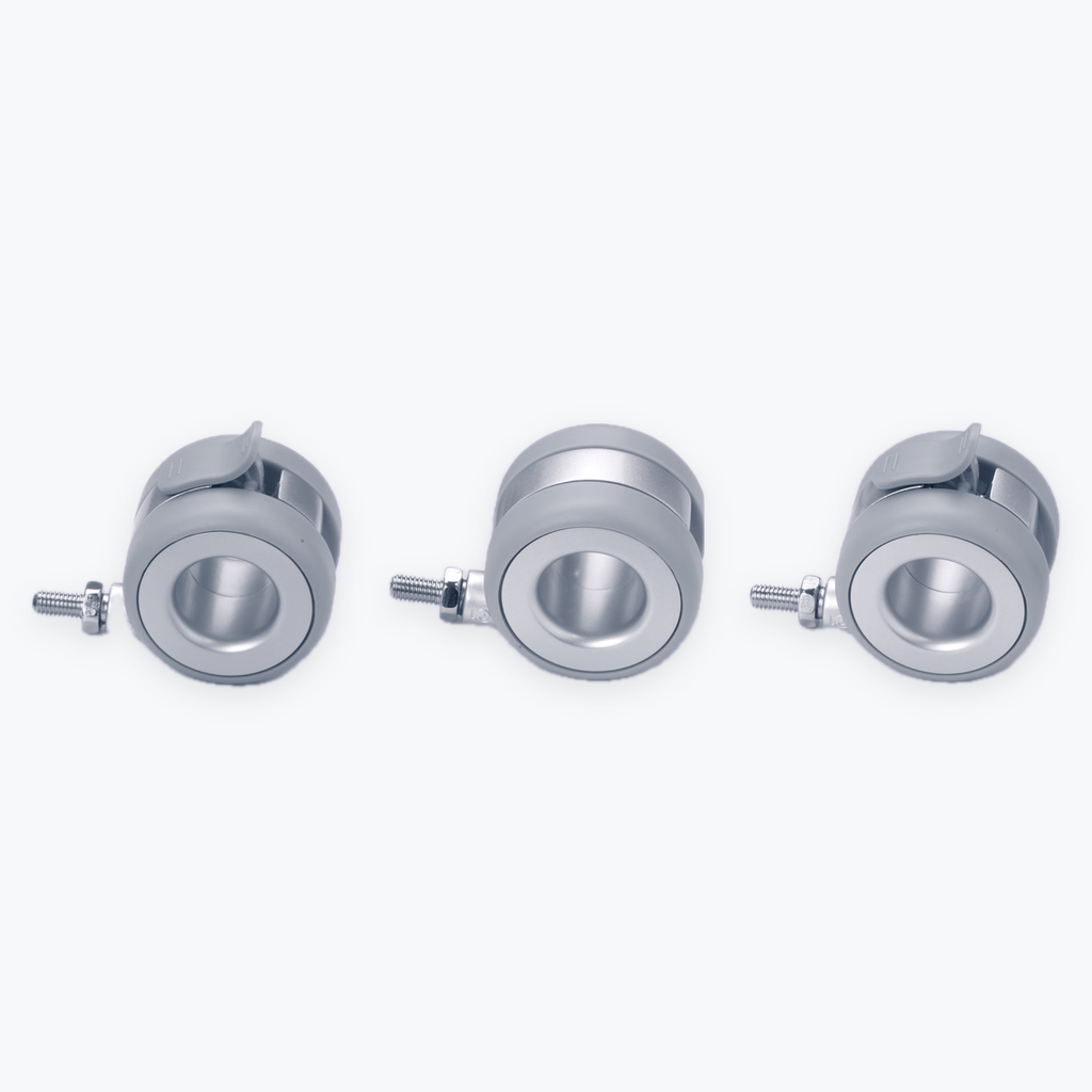 Three views of the matte-silver Standing Desk Casters