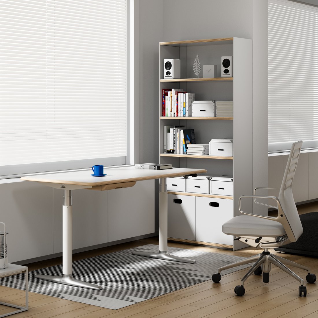 Grey Deskmith Ease standing desk in a quiet monochrome home office