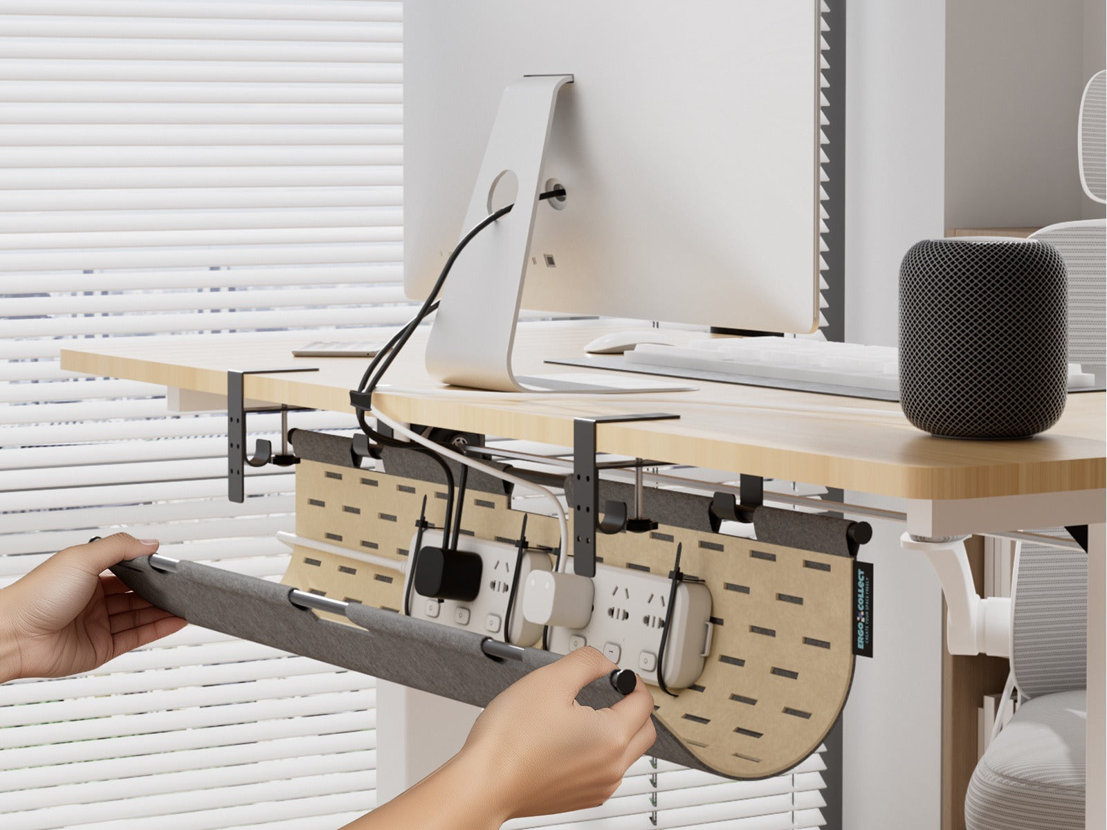 Felt panel lifted to reach cables, adapters, and power strips