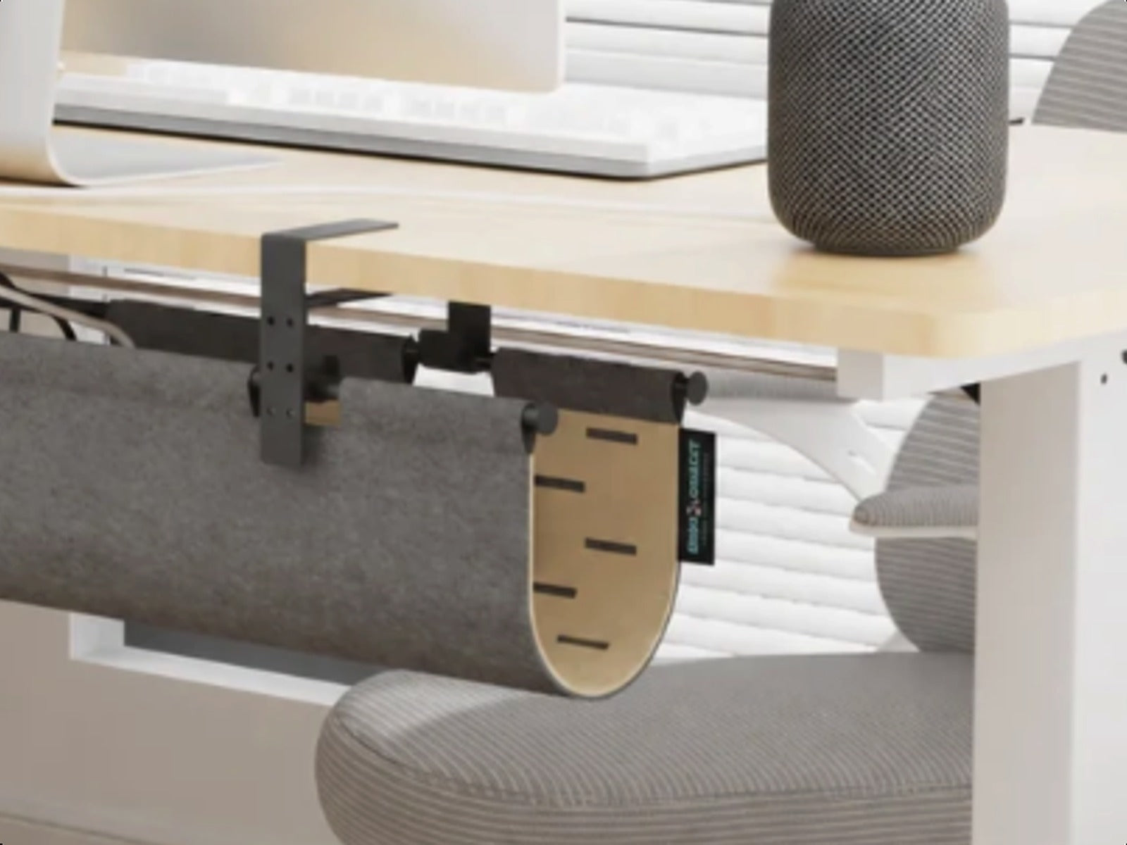 Close view of the felt panel installed beneath the desk