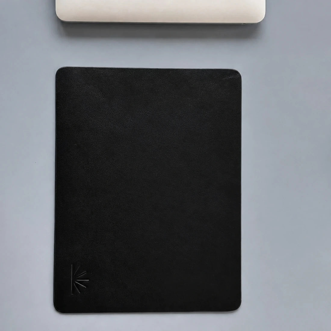 Compact Charcoal Black Napa mouse pad viewed from above